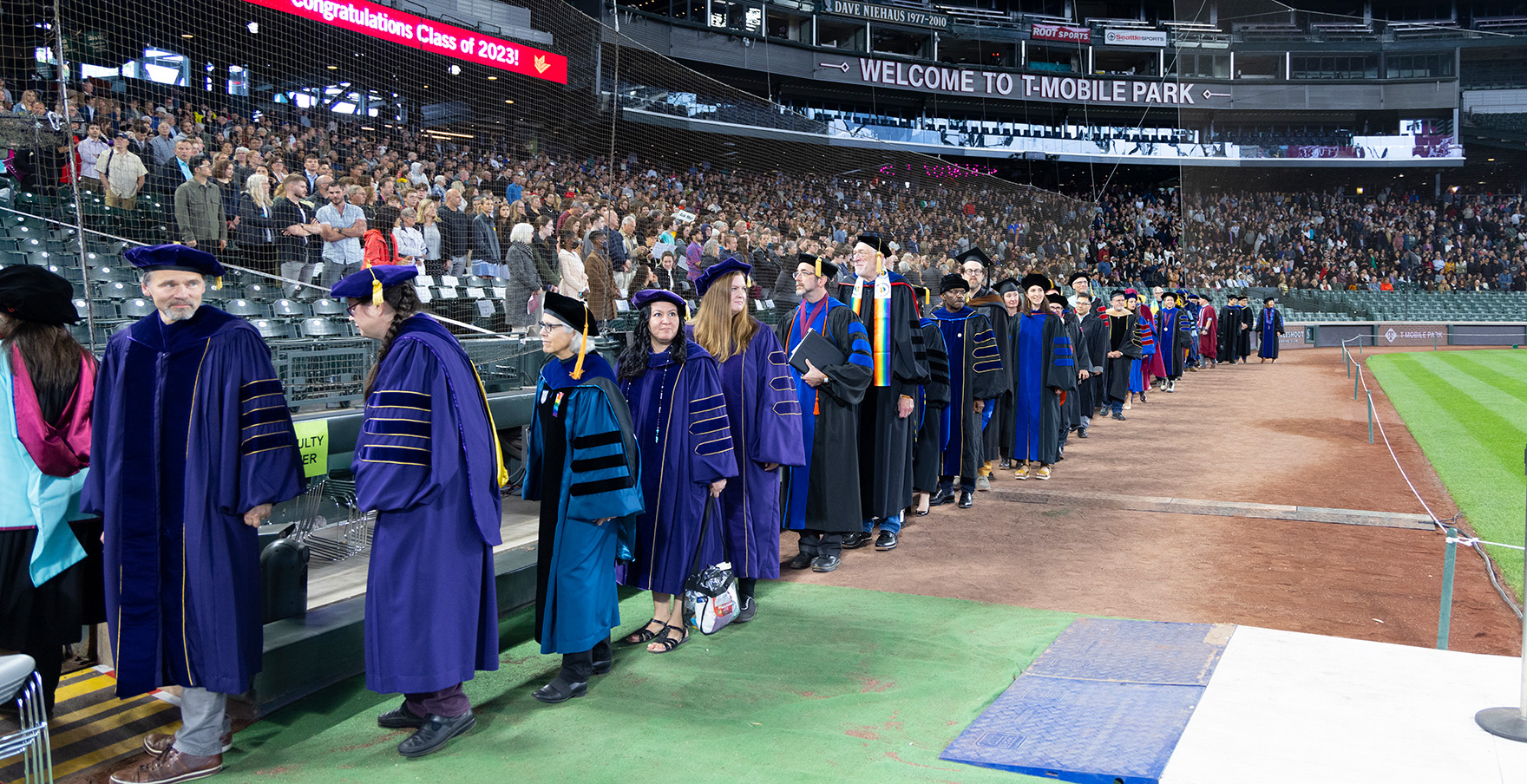 SPU faculty file into T-mobile Park | photo by Mike Siegel