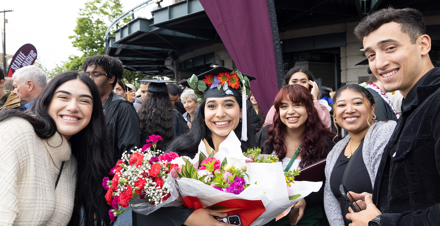 SPU graduates celebrate outside of T-Mobile Park | photo by Mike Siegel