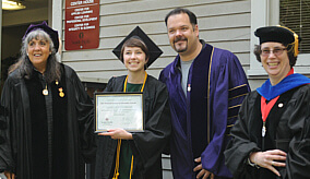 Graduate receiving award