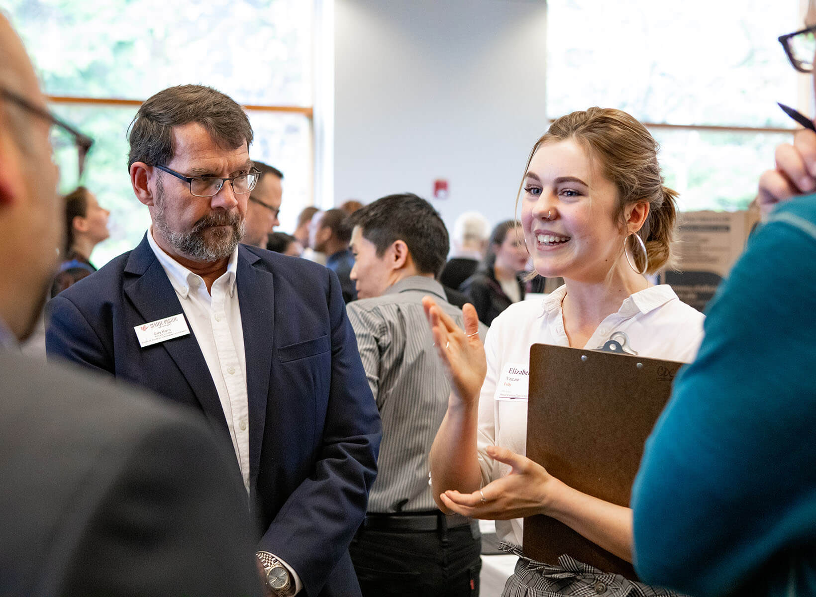 An SPU business student networks with local employers | photo by Lynn Anselmi