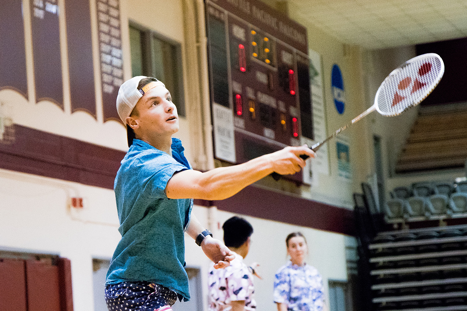 A student plays badminton | photo by Sydney Martin