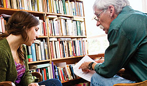 Professor of English Luke Reinsma with a student.