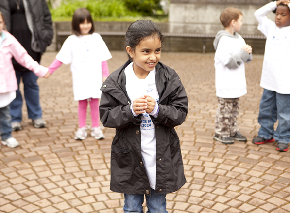 Kindergartner Clapping Hands in Martin Square