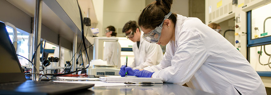 SPU students record their findings in the lab