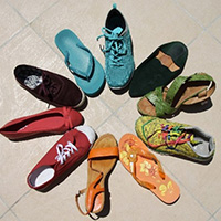 A photo of a collection of colorful shoes arranged in a circle