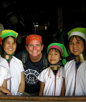 Kristi Layton, 1997 SPU alumna and 2001 Response essayist (center), with new friends in Myanmar at Inle Lake.